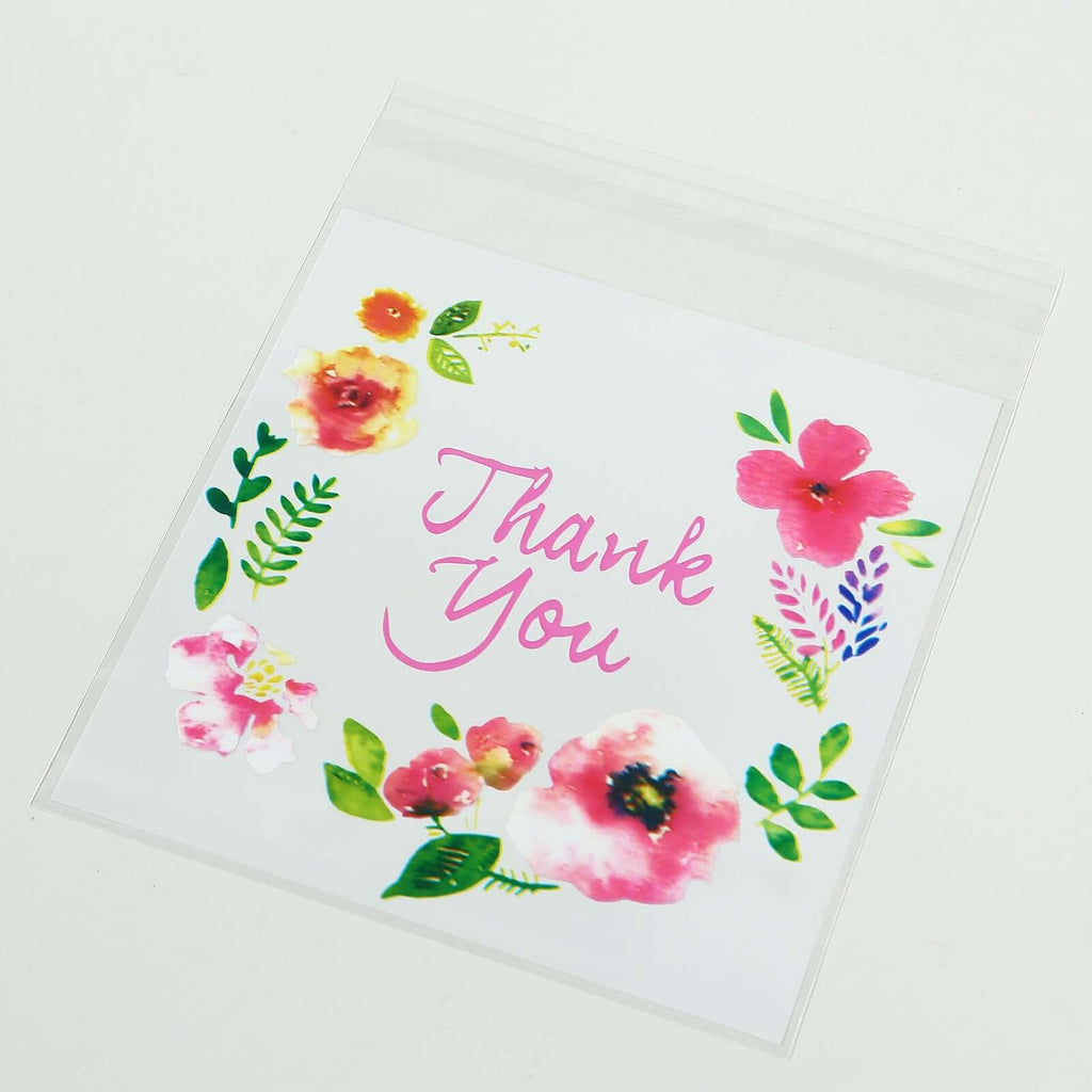 100 - Pack PVC Cookie Candy Bags White/Clear - Decorative Self Adhesive Goodie Bags With "Thank You" Print & Floral Accents for Stylish Wedding Birthday Party Favors 6"x7" - Bell Racket Store