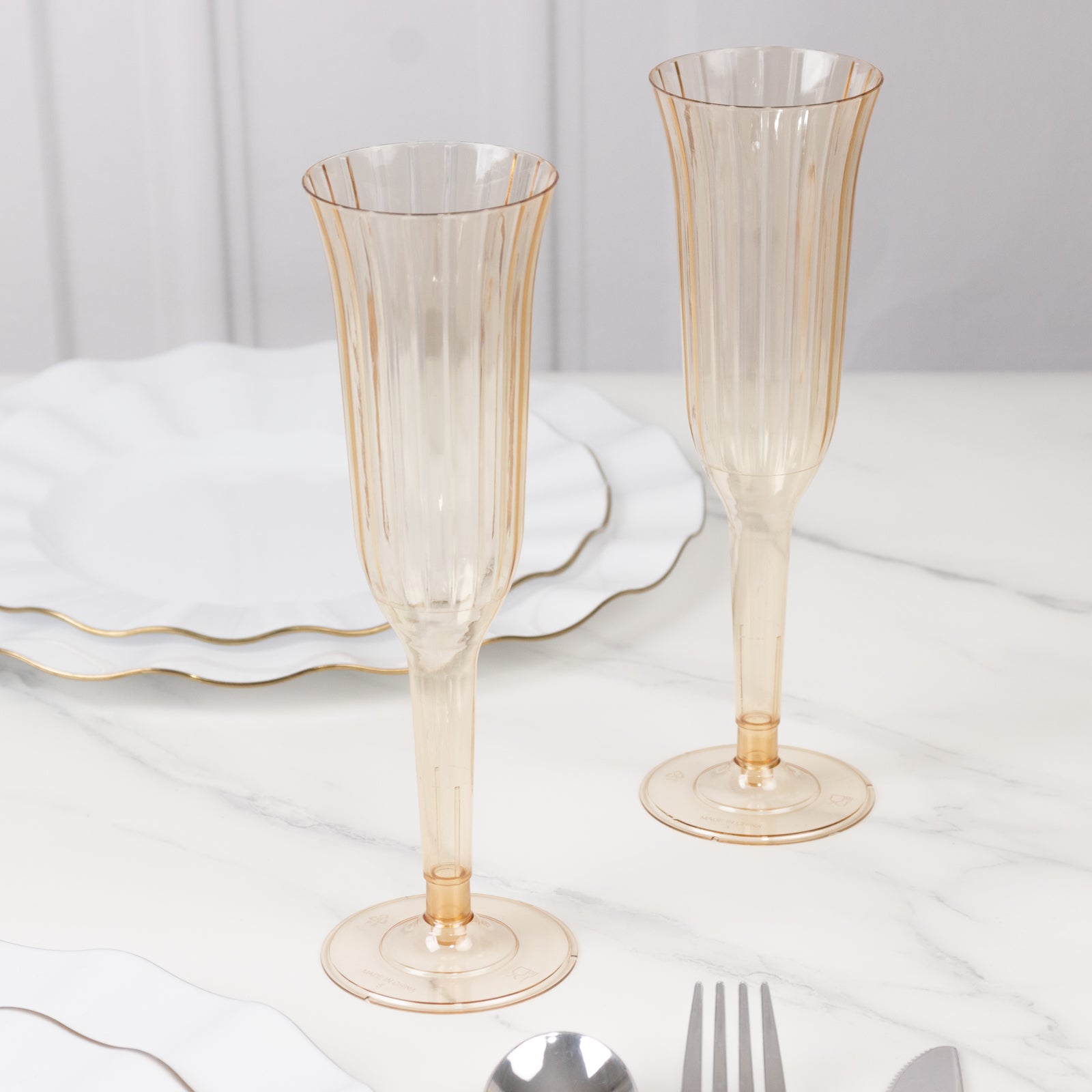 12 - Pack Plastic Champagne Flutes Transparent Amber Gold Flared Design - Lightweight Disposable Toasting Glasses 6oz - Bell Racket Store