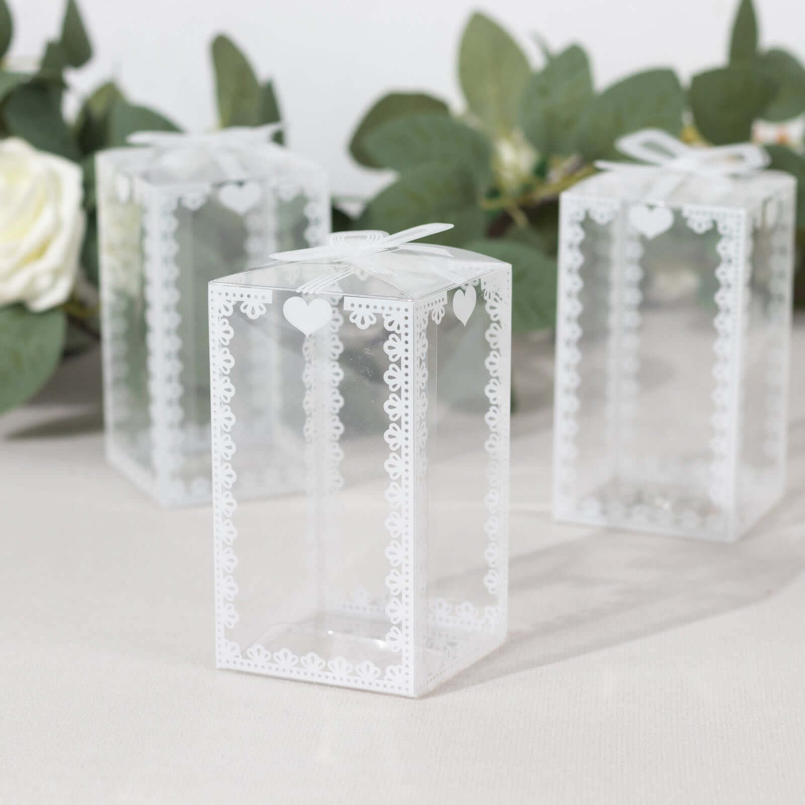 25 Pack Clear Rectangle Candy Gift Boxes With Bowknot and White Lace Pattern, 4" Transparent Plastic Party Favor Boxes - 2"x2"x4" - Bell Racket Store
