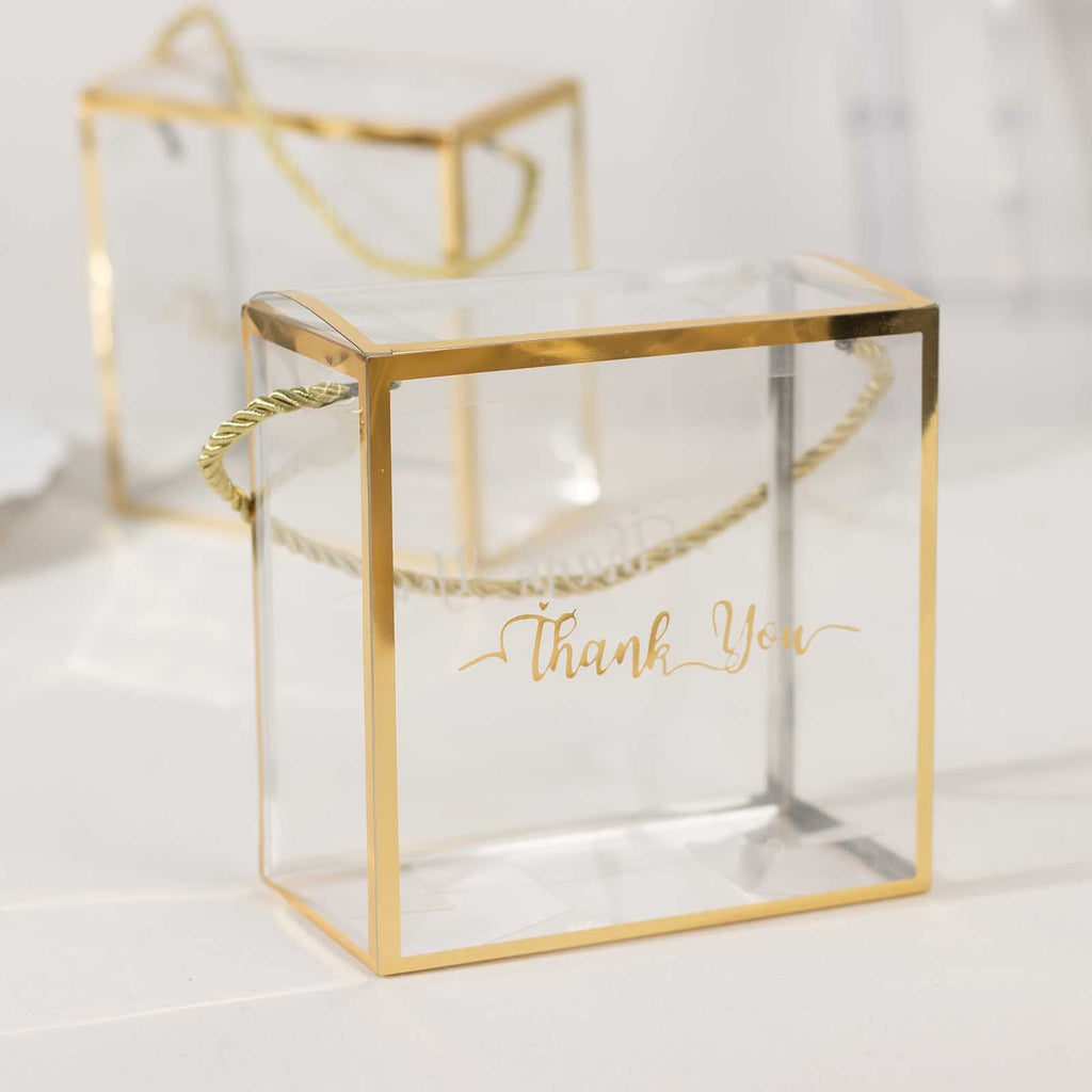 25 Pack Gold Trimmed Clear PVC Gift Boxes with Rope Handles and Thank You Print, Transparent Portable Candy Favor Boxes - 5.5"x5.5" - Bell Racket Store