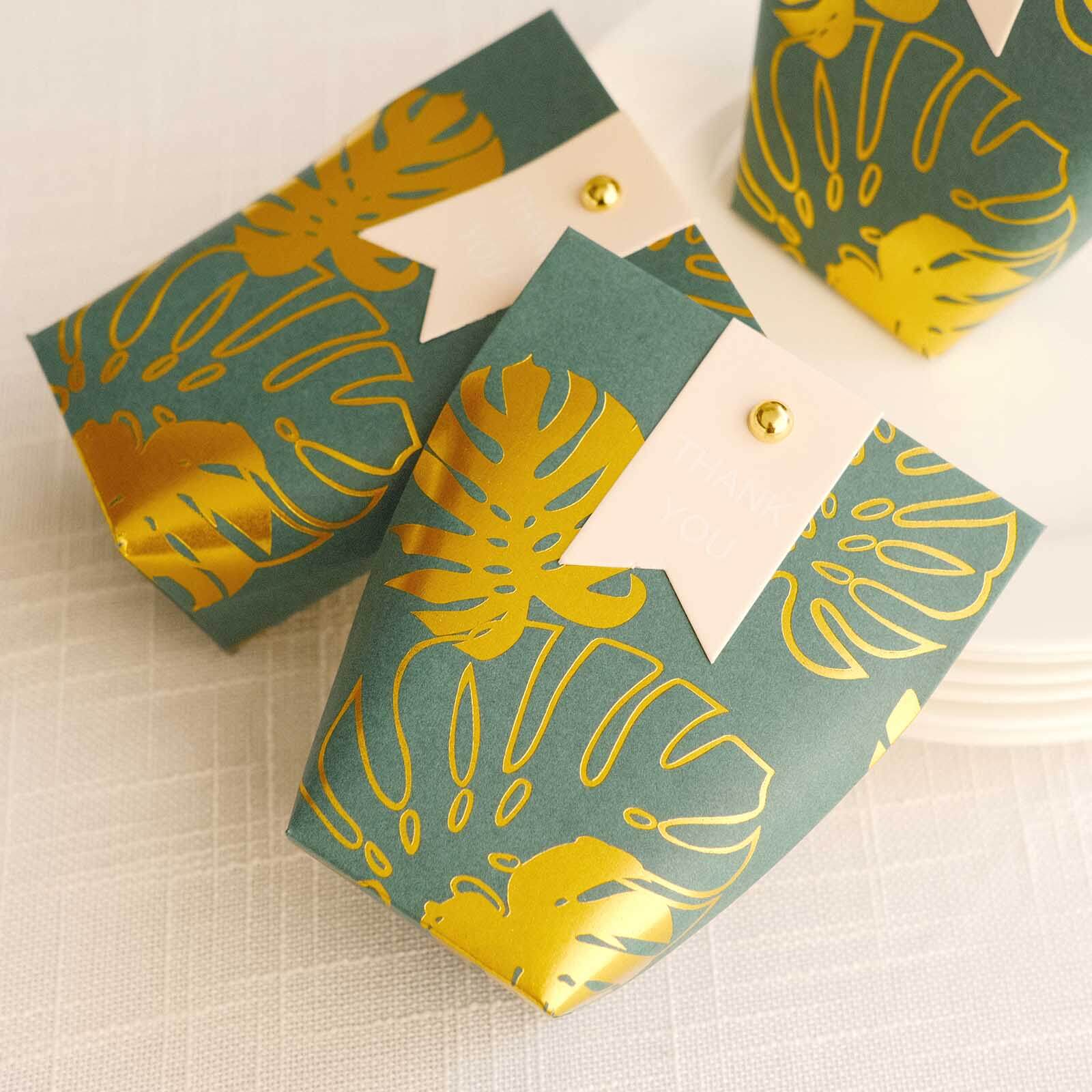 25 Pack Hunter Emerald Green Paper Pouch Candy Gift Bags With Gold Monstera Leaves Print, Party Favor Boxes with Pin and Tags - 4.5"x4" - Bell Racket Store