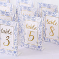 25 - Pack Paper Wedding Table Numbers 1 - 25 White/Blue French Toile Design - Free Standing Double Sided Table Signs with Glam Gold Foil Numbers 7" - Bell Racket Store