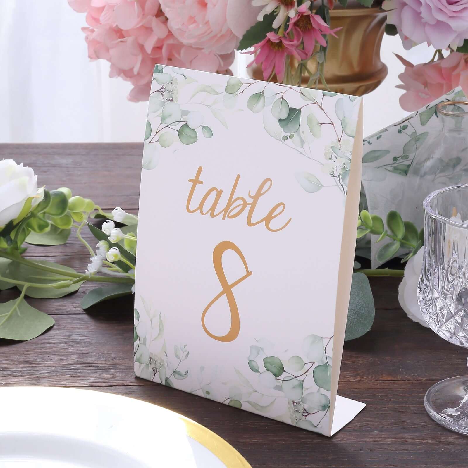 25 - Pack Paper Wedding Table Numbers 1 - 25 White/Green Eucalyptus Leaves Design - Free Standing Double Sided Table Signs with Glam Gold Foil Numbers 7" - Bell Racket Store