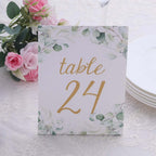 25 - Pack Paper Wedding Table Numbers 1 - 25 White/Green Eucalyptus Leaves Design - Free Standing Double Sided Table Signs with Glam Gold Foil Numbers 7" - Bell Racket Store