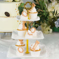3-Tier Plastic Square Cupcake Stand Tower White - Charming Disposable Dessert Display Serving Tray Platter with Heart Wavy Edge & Gold Top Handle for Tea Parties Weddings & Special Occasions 13"