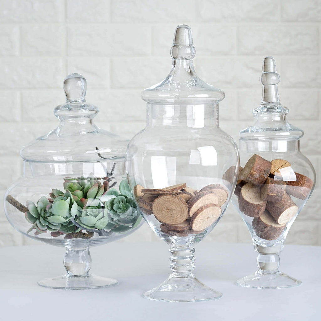 Set of 3 Glass Candy Jars Pedestal Apothecary Design Clear with Snap-On Lids - Stylish Party Favor Containers 10"/12"/14"