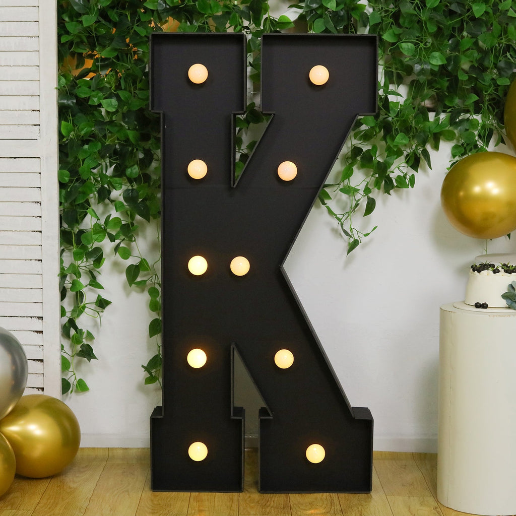 Giant LED Marquee Light Up Letter "K", Black 4ft Pre - Cut Foam Board with 10 Warm White Battery Operated LEDs, Glue Gun and Sticks - Bell Racket Store