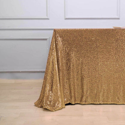 Sequin 90"x156" Rectangle Tablecloth Gold - Seamless Twinkling Design for Chic Celebrations - NestOCart