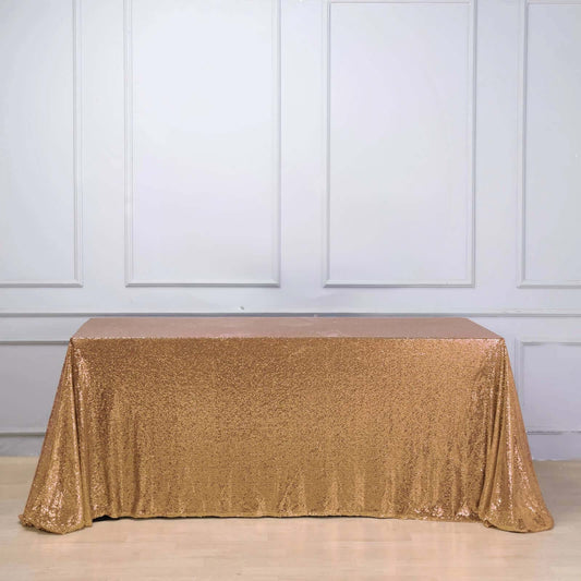 Sequin 90"x156" Rectangle Tablecloth Gold - Seamless Twinkling Design for Chic Celebrations - NestOCart